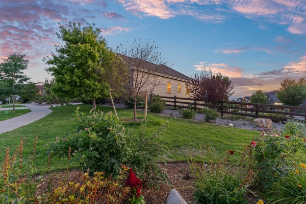 Discover this inviting home surrounded by vibrant gardens and picturesque views, perfect for outdoor enthusiasts.