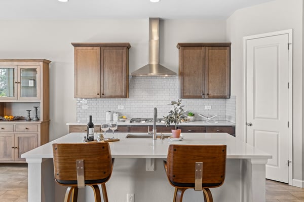 Modern kitchen featuring sleek cabinetry, spacious island seating, and contemporary appliances for effortless entertaining.