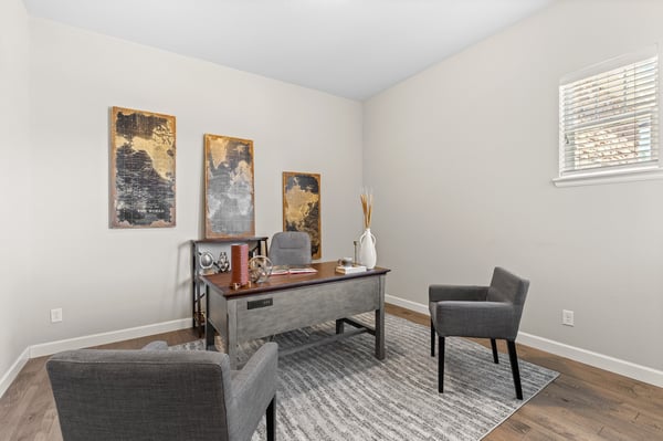 Bright and versatile office space featuring modern decor and ample natural light for productivity.