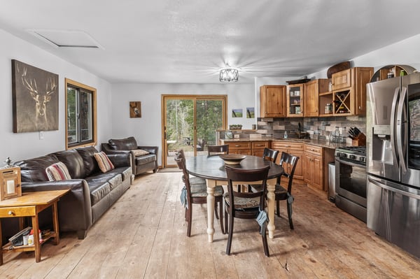 Spacious open-concept kitchen and living area featuring modern appliances and abundant natural light.