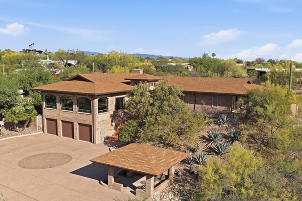 Spacious hillside home with unique architecture, expansive outdoor space, and stunning desert views.