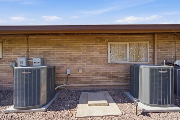 This property features dual high-efficiency AC units, ensuring optimal climate control year-round.