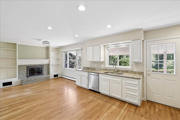 Bright and spacious kitchen seamlessly flows into the inviting living area, perfect for everyday living.
