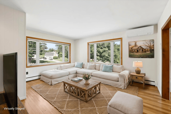 Bright, open living space with expansive windows, perfect for relaxation and enjoying natural light.
