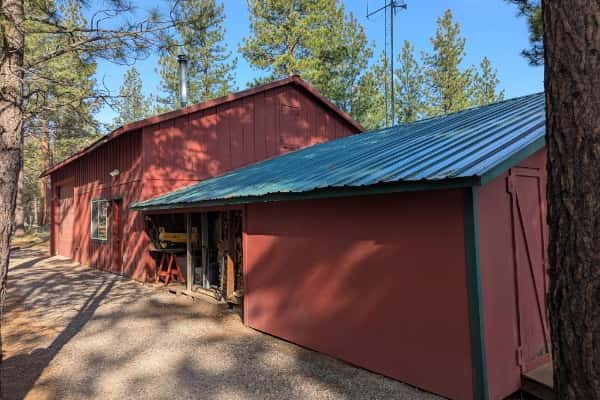 46 of 61. 28'x30' shop with 28'x16' RV bay and two additional 22'x14' finished, insulated flex/clean rooms -- perfect for a home office, game room, fitness studio, craft space, or more! The 2-car oversized garage has heated storage, dedicated wood storage, and a storage room. Plus exterior shed and wood storage.