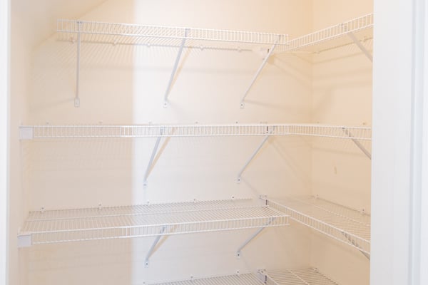 Pantry with wire shelving, perfect for organizing your essentials and maximizing functionality.