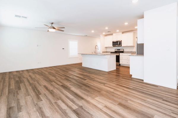 Spacious open-concept living area featuring modern finishes and abundant natural light throughout.