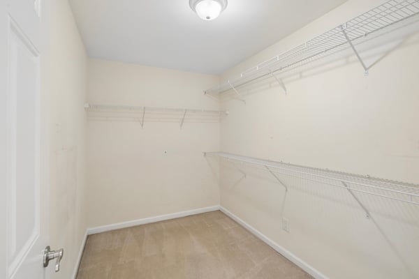 Walk-in closet in primary suite