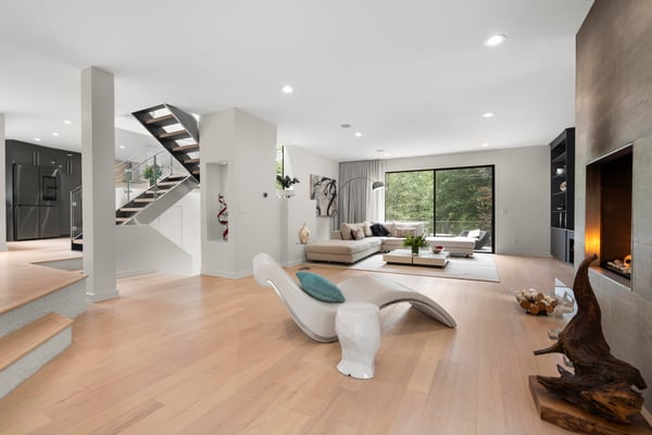 Spacious living area with unique architectural features and abundant natural light, perfect for modern living.
