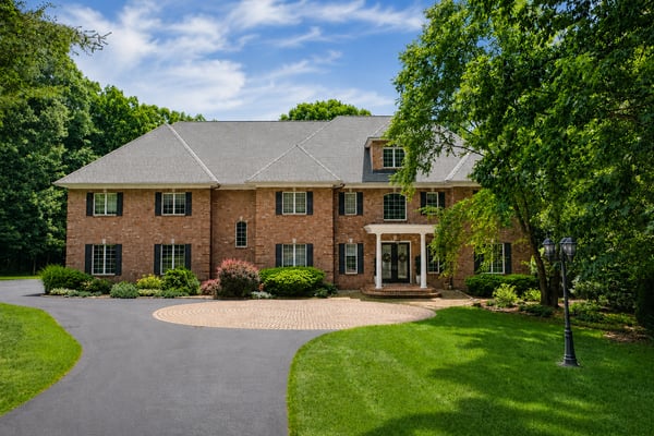 STATELY GLASTONBURY COLONIAL SITED ON OVER 6 ACRES WITH RESORT STYLE POOLSCAPE