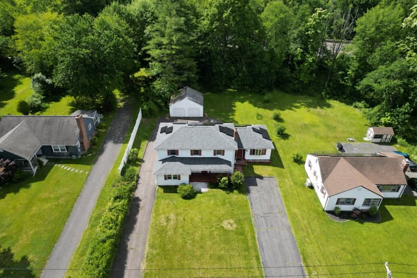 SPACIOUS EXPANDED COLONIAL WITH EXCEPTIONAL FLEXIBILITY & IN-LAW POTENTIAL