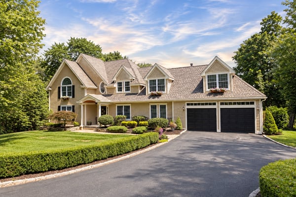 TIMELESS NEW ENGLAND ARCHITECTURE MEETS A STORYBOOK WATERFRONT SETTING