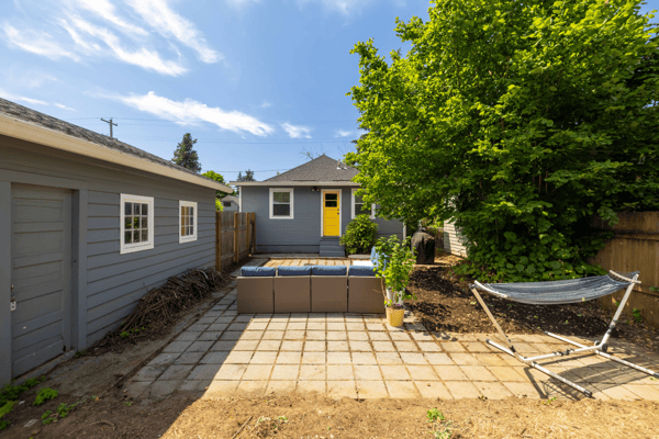 This property features a spacious outdoor area with a hot tub and ample room for relaxation.