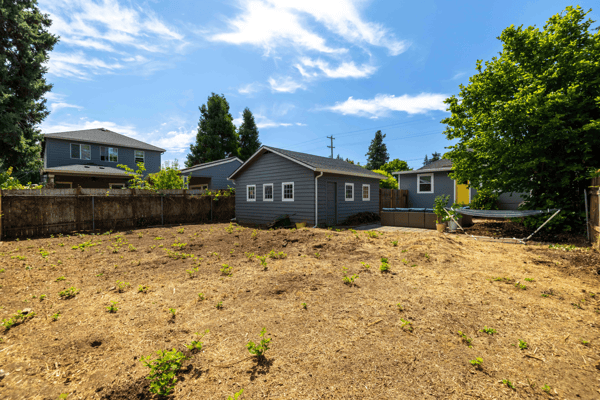 Spacious lot with potential, featuring a well-maintained residence and ample outdoor space for gardening or recreation.