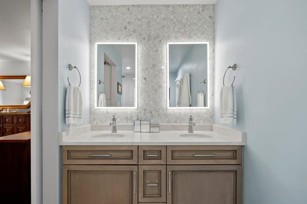 Primary bathroom's vanity area with double sink