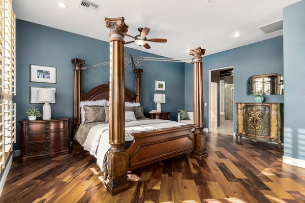 Spacious owner's suite featuring sophisticated finishes, abundant natural light, and easy access to the luxurious primary bathroom. The perfect blend of comfort and privacy.