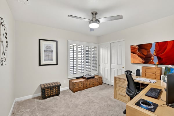 Create the ideal work-from-home setup in this spacious office or flex room featuring neutral finishes, natural light, and generous floor space. It can easily serve as an additional guest room when needed.