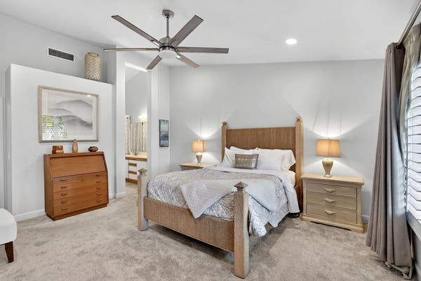 Designed for relaxation, this primary suite features ample square footage, natural light, and convenient access to the ensuite bath. A comfortable and private space to start and end each day.