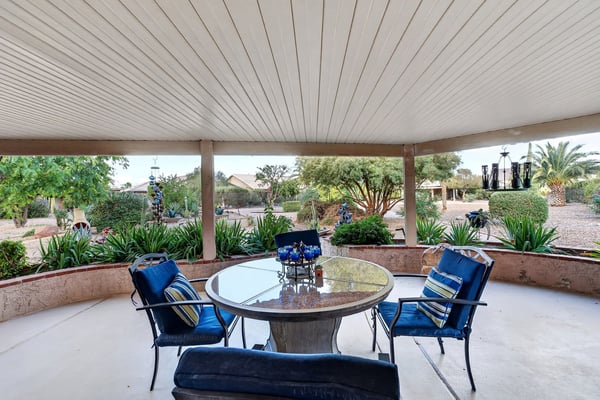 Enjoy peaceful views of mature landscaping and desert gardens from this inviting covered patio. The large shaded area offers comfortable outdoor living throughout the year.