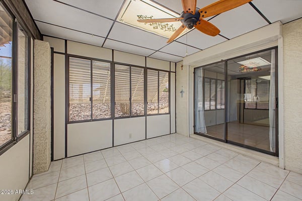 This enclosed Arizona room provides additional living space with abundant natural light and easy indoor-outdoor flow. The flexible layout is ideal for recreation, hobbies, entertaining, or casual relaxation.