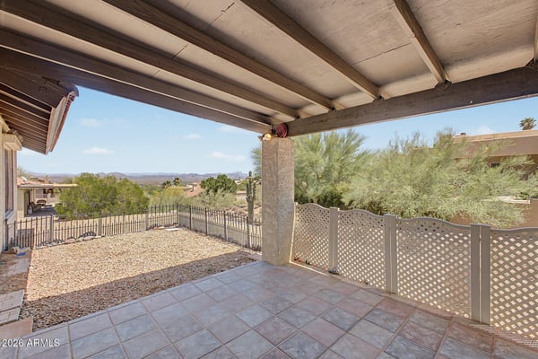 Take in beautiful desert and mountain vistas from this covered patio retreat. The spacious outdoor area is perfect for entertaining, outdoor dining, or simply enjoying the peaceful Fountain Hills setting.