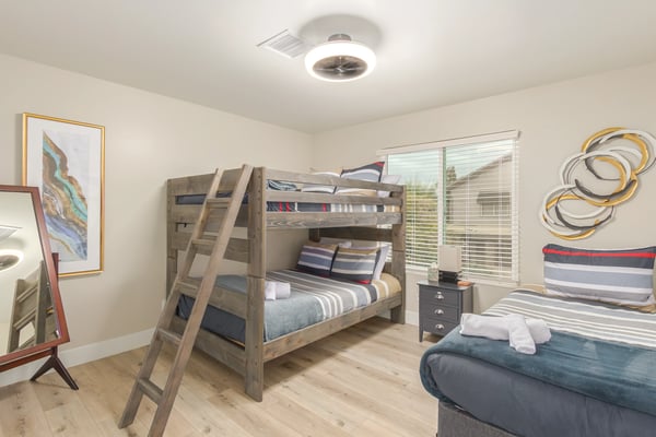 Stylish guest room featuring custom bunk beds, contemporary finishes, and abundant natural light. A versatile Scottsdale space ideal for hosting visitors and extended stays.
