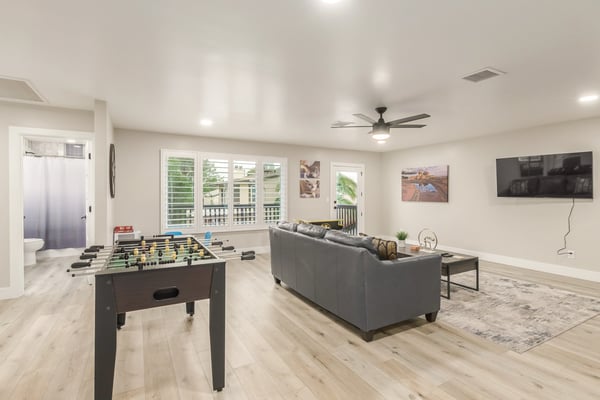 Large upstairs loft with dedicated game space, media viewing area, natural light, and balcony access. Perfect for entertaining or everyday relaxation in Scottsdale.
