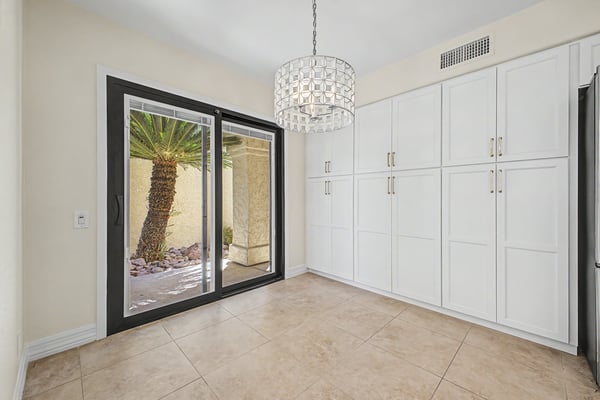 Casual dining space featuring custom storage cabinetry, designer lighting, and courtyard views. A bright and inviting area that blends functionality with modern style.
File Name: 11 15 - Purdue.jpg