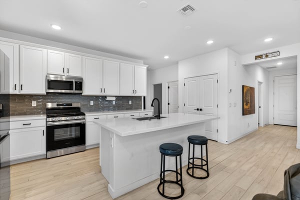 From the moment you enter, you'll appreciate the open floor plan connecting the spacious kitchen, dining area, and great room with stylish finishes, natural light, and modern design throughout.