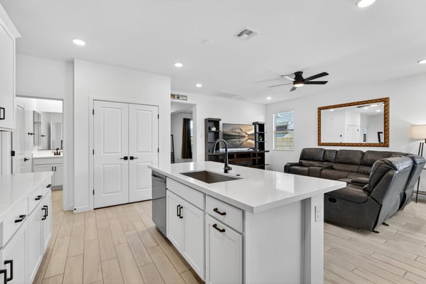 Experience effortless living with a bright open-concept layout that blends the kitchen and great room together, creating an ideal space for entertaining guests and enjoying everyday life in Surprise.