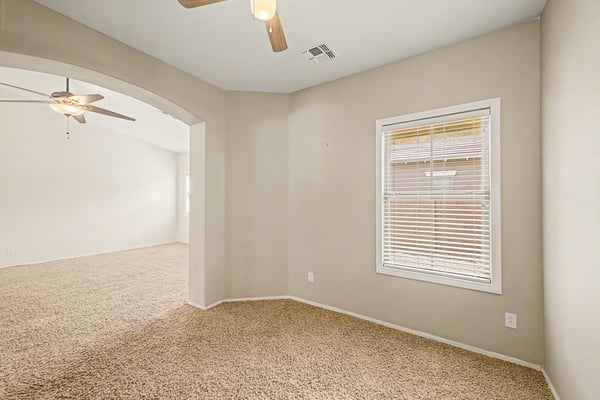 Dedicated office or den featuring natural light and a quiet setting, providing the perfect workspace for remote professionals or a peaceful reading room.