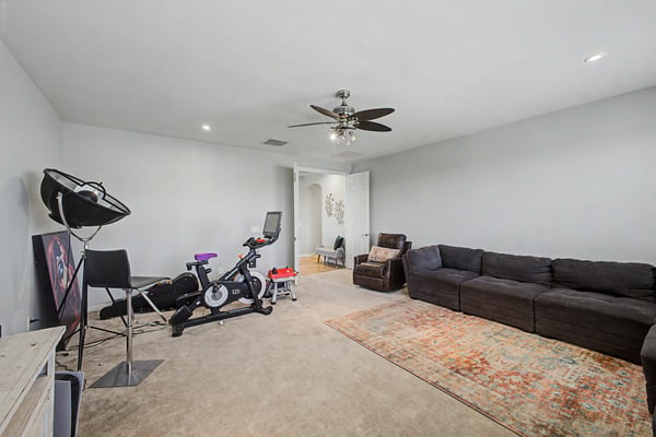 Alternate angle highlights the oversized loft with abundant space for entertaining, relaxing, exercising, or creating a secondary family room.