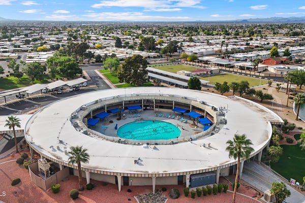 Enjoy access to the nearby Sun City community pool featuring shaded seating, spacious deck areas, and beautifully maintained recreational facilities designed for year-round enjoyment.