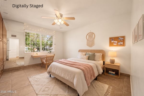 Digitally staged bedroom with warm contemporary furnishings, soft neutral colors, custom built-in cabinetry, and abundant natural light, helping buyers visualize the room's full potential.