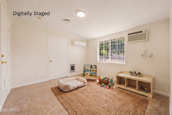 Digitally staged rendering illustrates the room as a dedicated pet care and activity area with organized storage and comfortable finishes. The flexible design highlights the versatility of this bonus space.