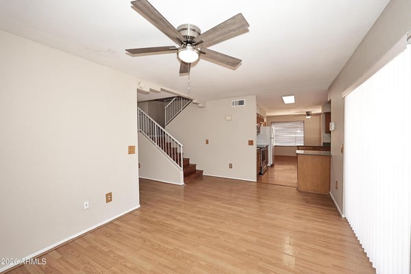 Spacious family room connects effortlessly with the kitchen, creating a functional open-concept layout ideal for gathering, entertaining, and everyday comfort