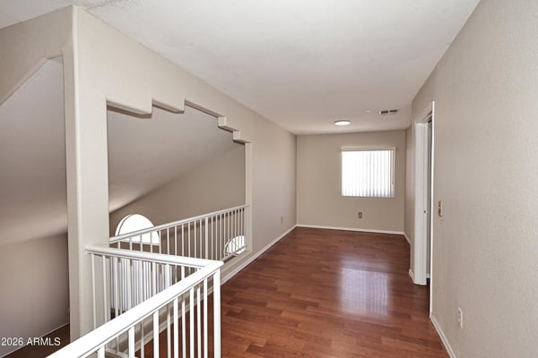Expansive upstairs loft is ideal for a home office, game room, study area, or second family room, offering exceptional flexibility for modern living.