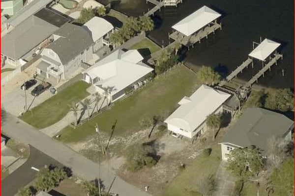 Spacious waterfront property featuring ample outdoor space your own boat dock. Perfect for boating enthusiasts!