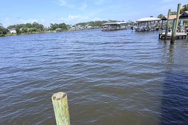 Enjoy stunning water views from this prime waterfront property, with direct access to boating and fishing.