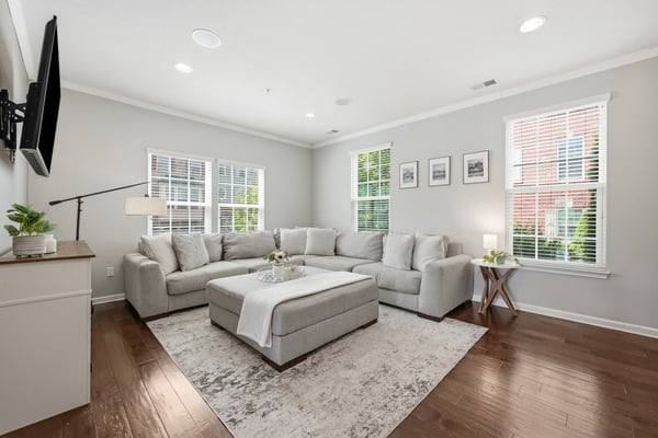The living room receives ample natural light.