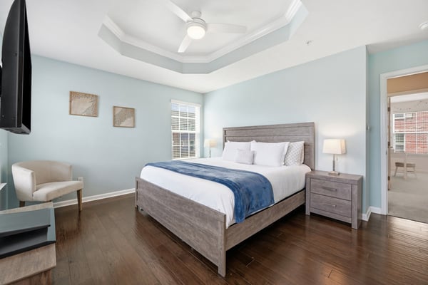 Bright and inviting bedroom featuring modern decor, a spacious layout, and ample natural light.