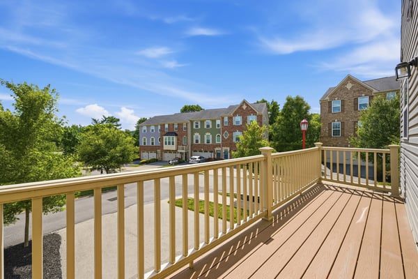 Spacious deck offering inviting views and easy access to nearby amenities in a vibrant community.