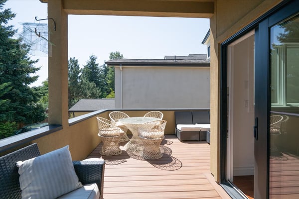 This partially covered deck allows for use of the space all year long.