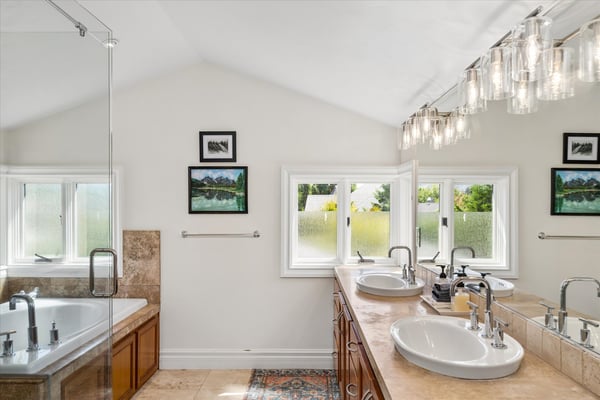 The spa-inspired bathroom is complete with a large rain fall shower and a jetted soaker tub for ultimate relaxation which will not disappoint.