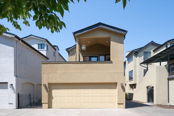 Just above the garage is the wrap-around deck off the kitchen.