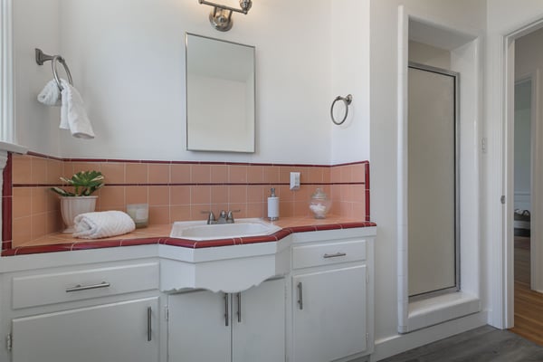 Large bathroom with separate tub and shower