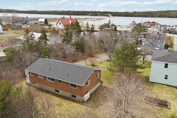 Across from Fisherman's Wharf, Eastern Passage! 4 bed., 2 bath, 2 kit., 2 level bungalow with detached garage!