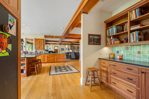 Bright and inviting kitchen seamlessly connects to a spacious living area, perfect for entertaining and everyday living.