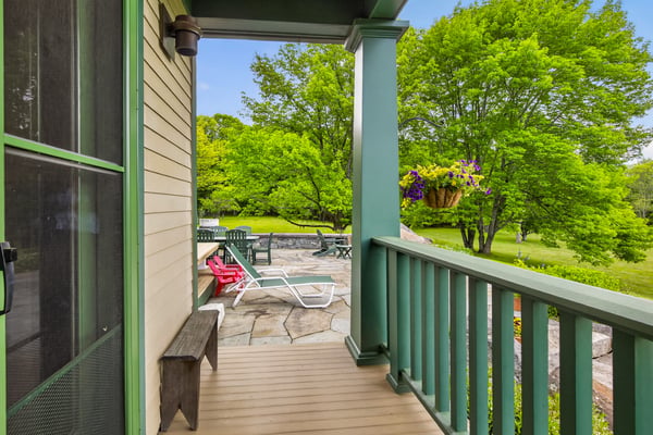 Discover a tranquil outdoor space with vibrant landscaping, perfect for relaxation and entertaining.