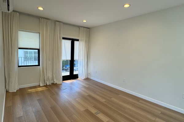 Living Room has French Doors leading to Balcony